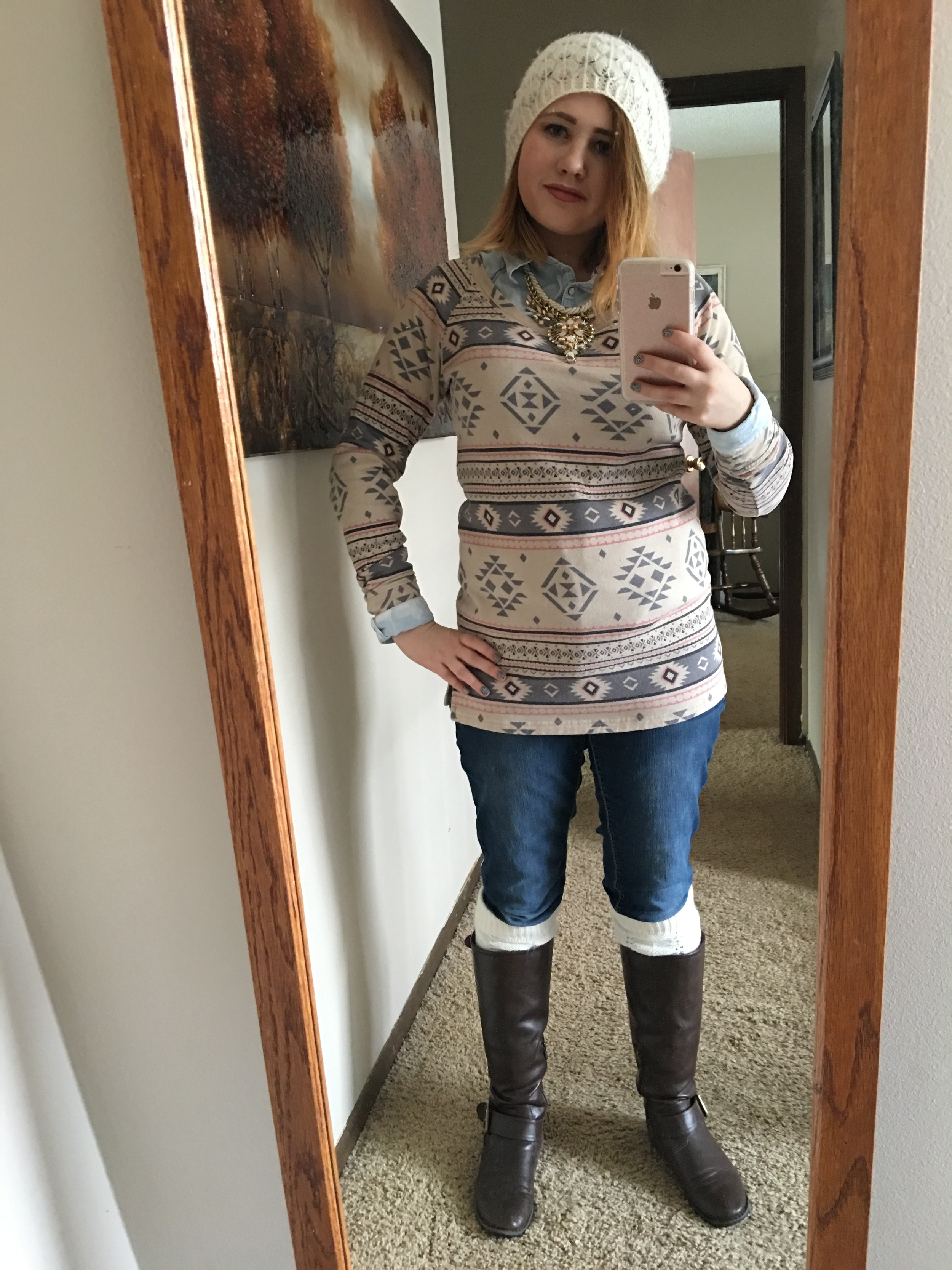 White beanie from Wet Seal, Aztec sweater from Maurices, leg warmers, brown boots from DSW, button up shirt from Maurices, necklace from Target, and jeans from Maurices.
